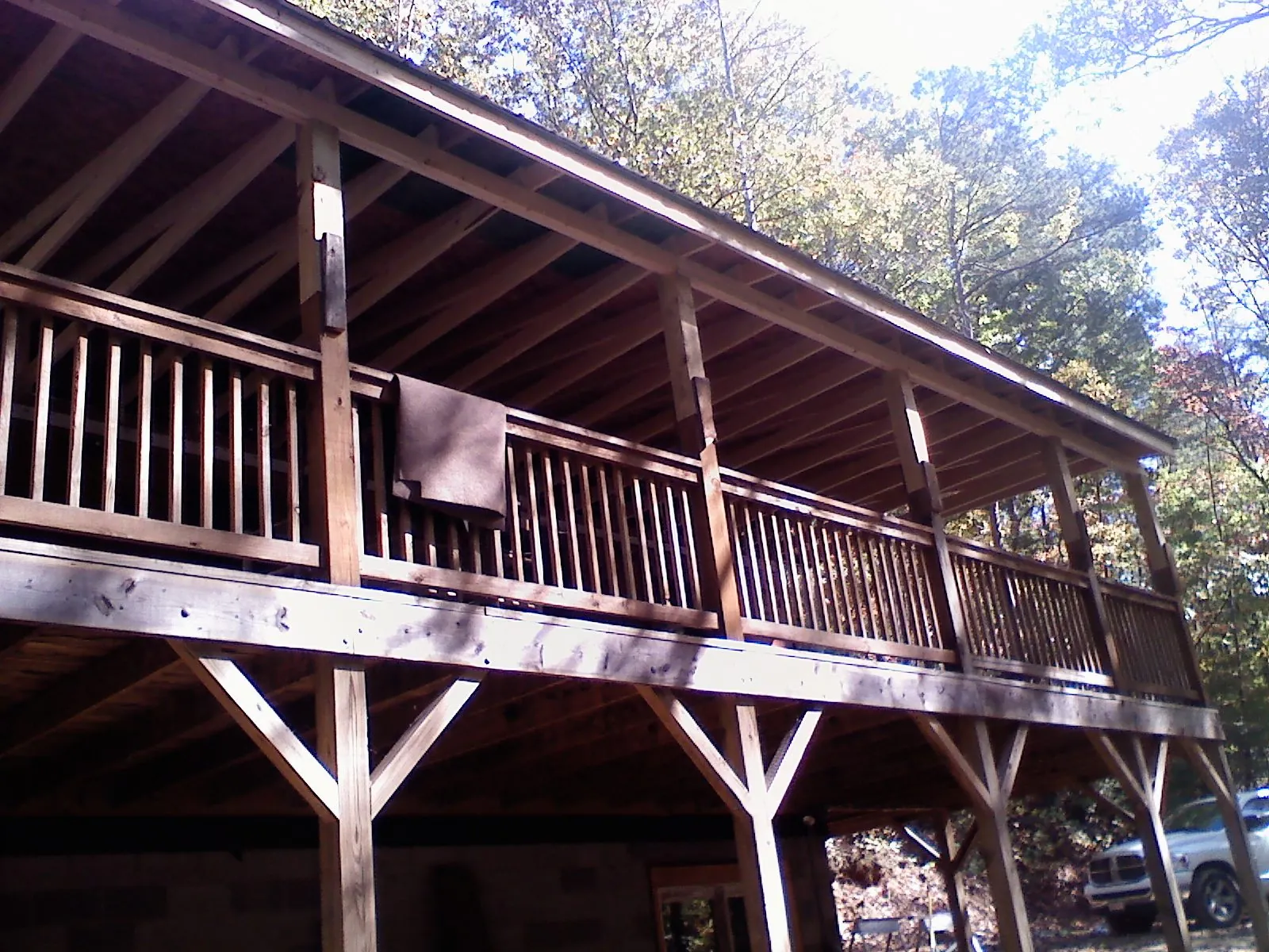 Timber framing under a new elevated porch and deck — Roof Leak Repair in Huntington Park by Roofing Brothers